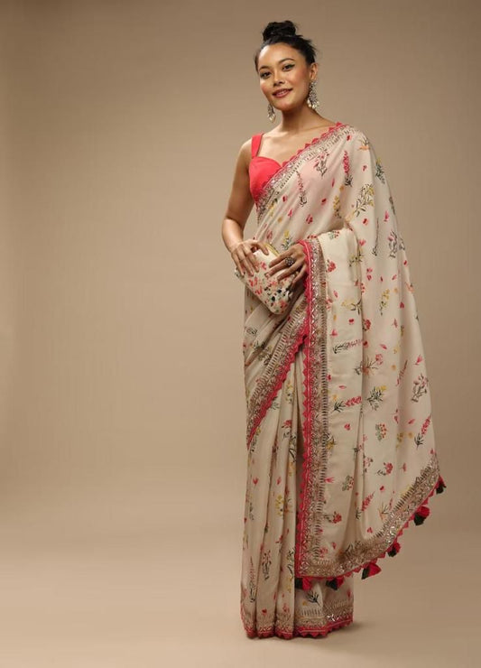 Exclusive designer print with lace border saree
